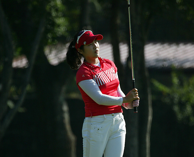 Lee Jeong-hwa watches the ball intently after teeing off. The Korean champ spices up the cast in the $75,000 ICTSI Ladies Open unfolding March 11 at Southlink Golf Club in Las Pinas. (DZRH)