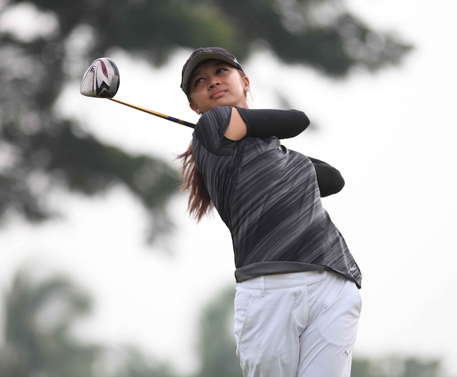 Princess Superal watches her drive on No. 3