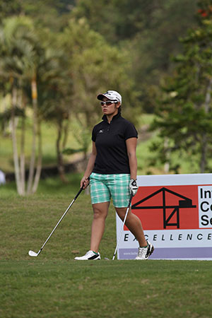 Japanese Fumika Kawagishi checks the wind, distance and the club to use on the par-3 No. 8