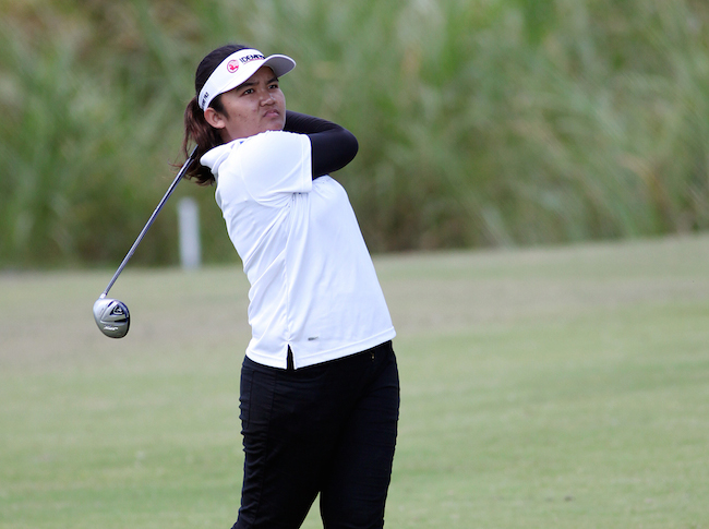 Thai Mookharin Ladgratok hits a fairway shot on No. 9