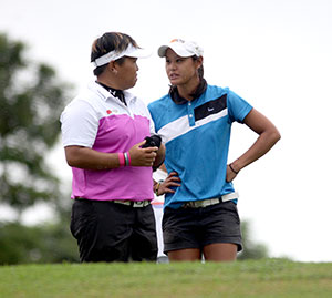 Chihiro Ikeda (left) and Cyna Rodriguez during a lull in play.