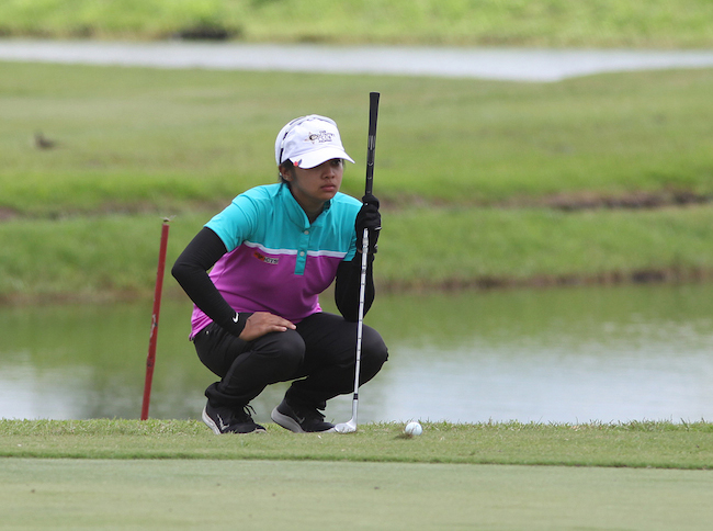 Princess Superal blasts out of the bunker on No. 15 en route to saving par from 10 feet