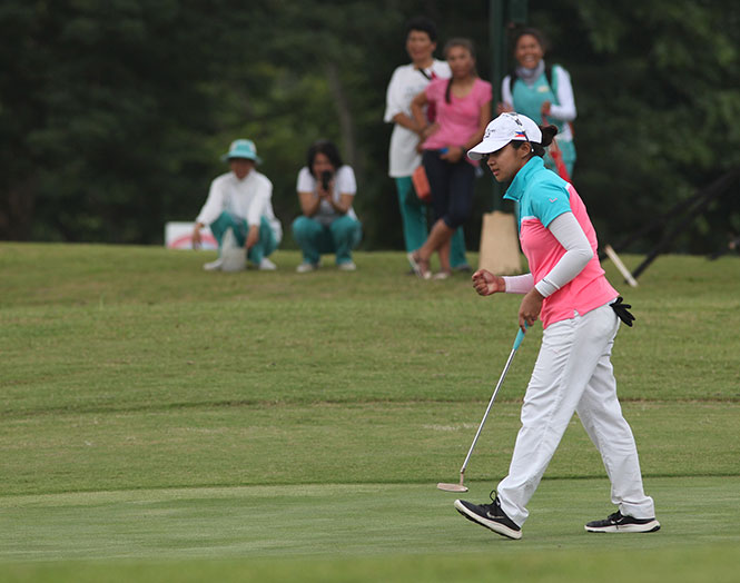 Princess Superan pumps her fist after sinking the title-clinching birdie putt on the first playoff hole.