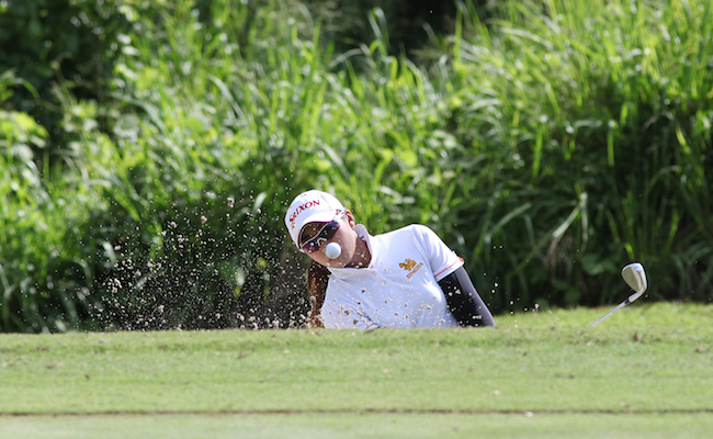 Thai Chatprapa Siriprakob flashes top form off the bunker to save par on the par-3 second hole.