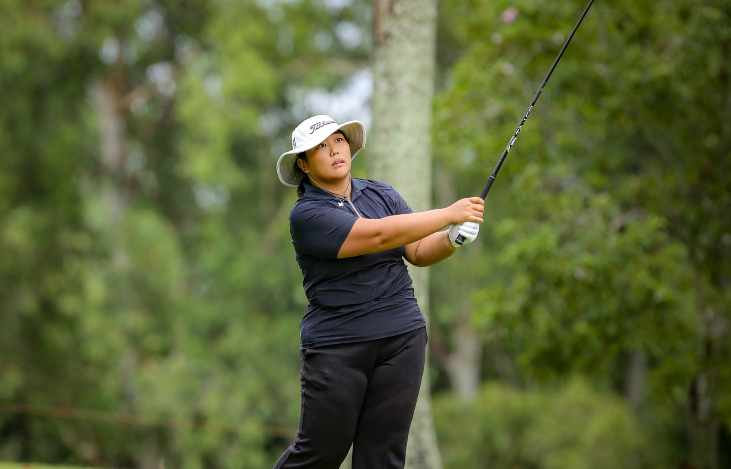 Unfazed Kim wrests control with solid 66, leads by 3