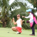 pagdanganan hole 5 assited by her caddie