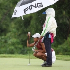 arevalo in shades and study her line in hole 9