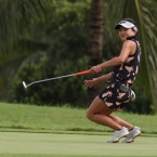 saruttaya reacts after she misses her putt in hole 1