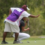 cyna with caddie giving instruction